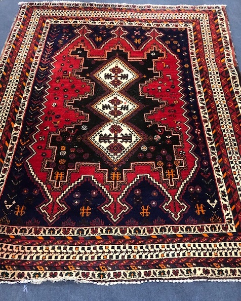 A Shahsavan red ground rug 210 x 164cm